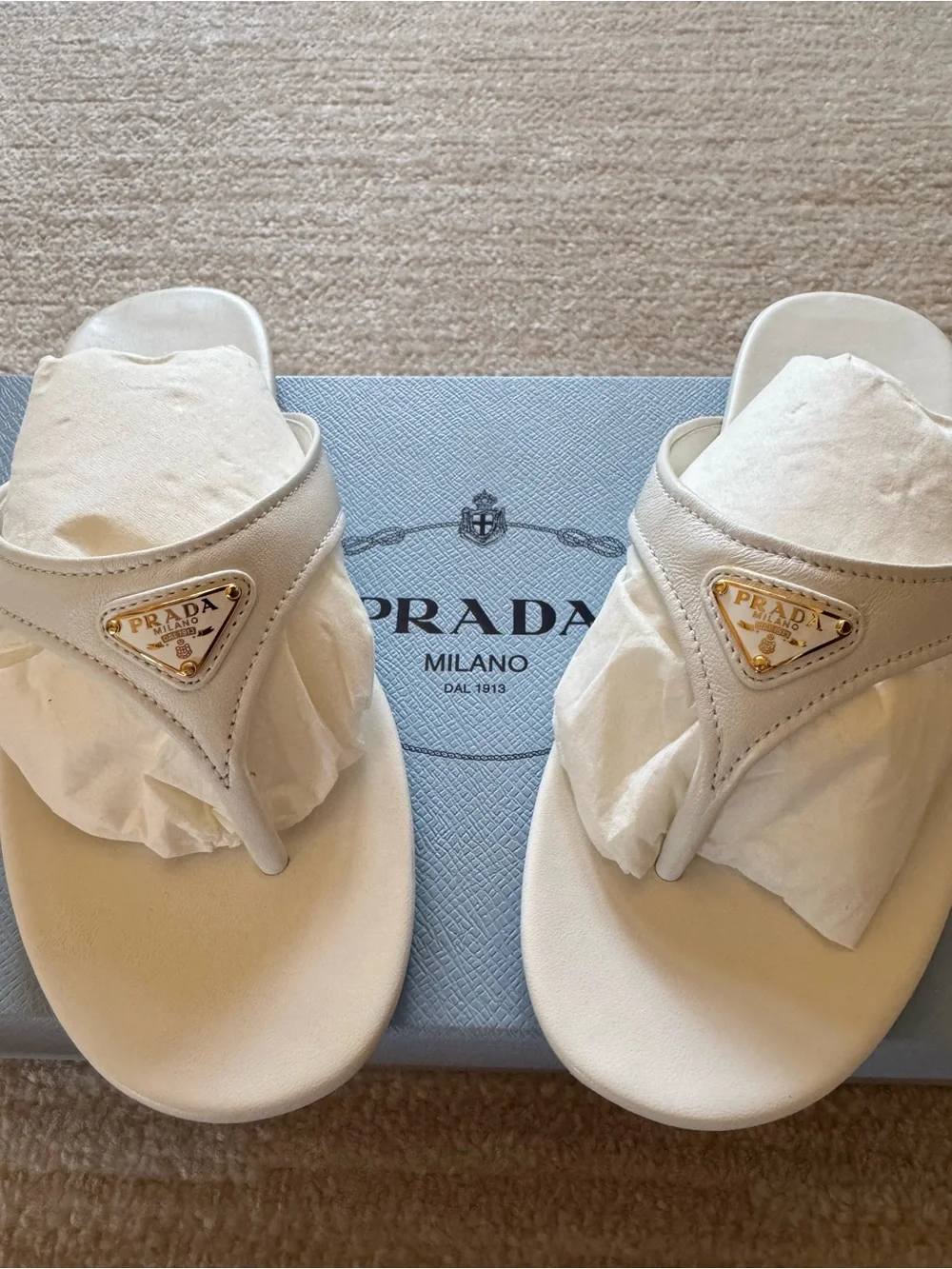 Prada designer white Leather Thong Sandals with Gold Triangle Logo